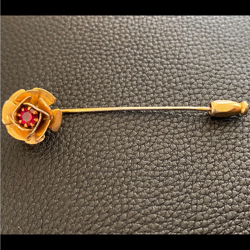 Elegant Gold Floral Brooch with Red Accent